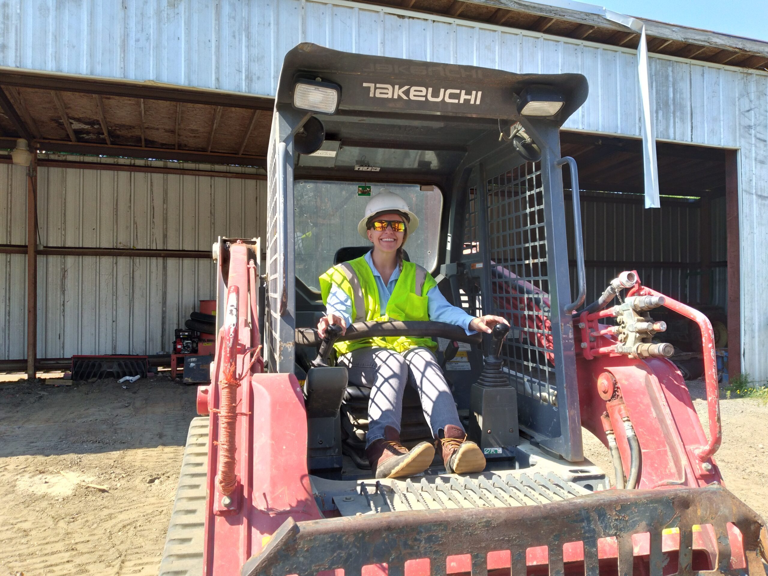 Randi learning how to use a Forklift